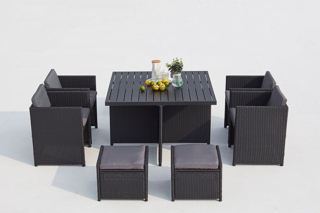 salon de jardin encastrable de 8 places en résine tressée Noir et gris sur fond Blanc