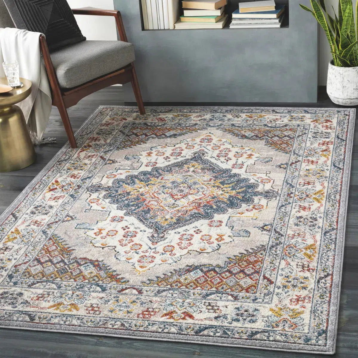 Tapis SURYA Jade oriental, médaillon bleu foncé, touches rouille et moutarde sur fond gris