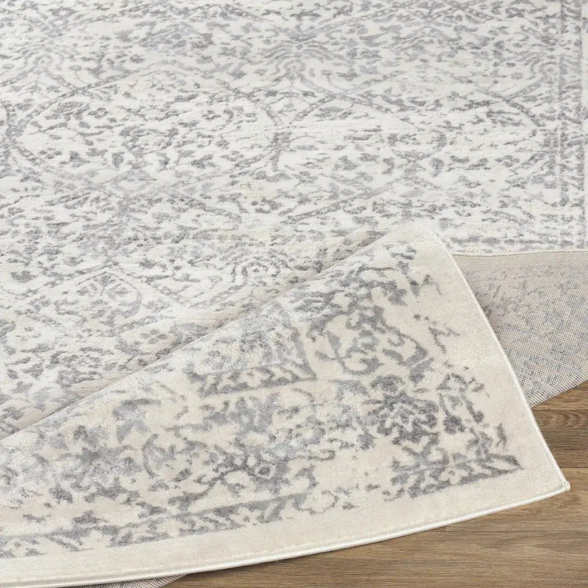 Tapis SURYA Margaux oriental vintage, motif d'arabesques délavées gris et anthracite sur fond blanc cassé, vue 3