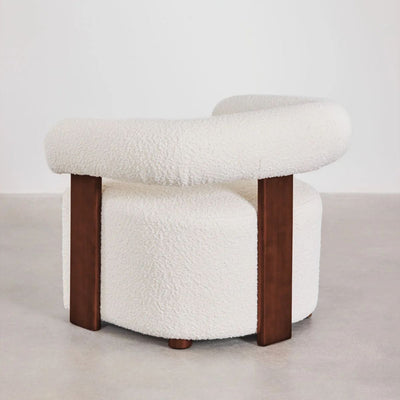 Fauteuil SKLUM en tissu bouclé et bois d'hévéa Mauro