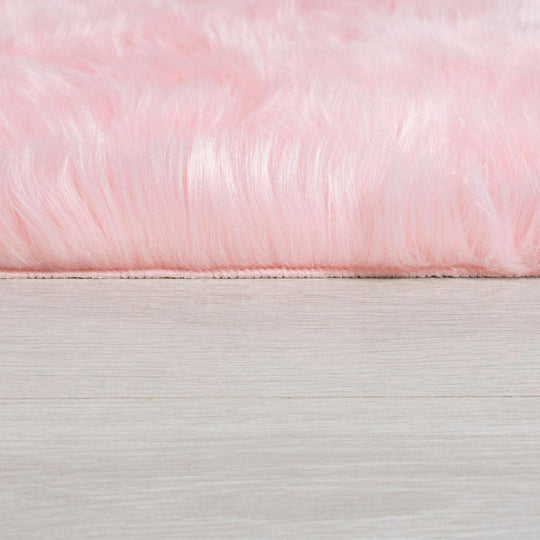 Tapis effet fourrure Rose