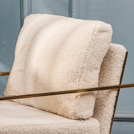 Fauteuil de salon en métal et bouclettes blanc