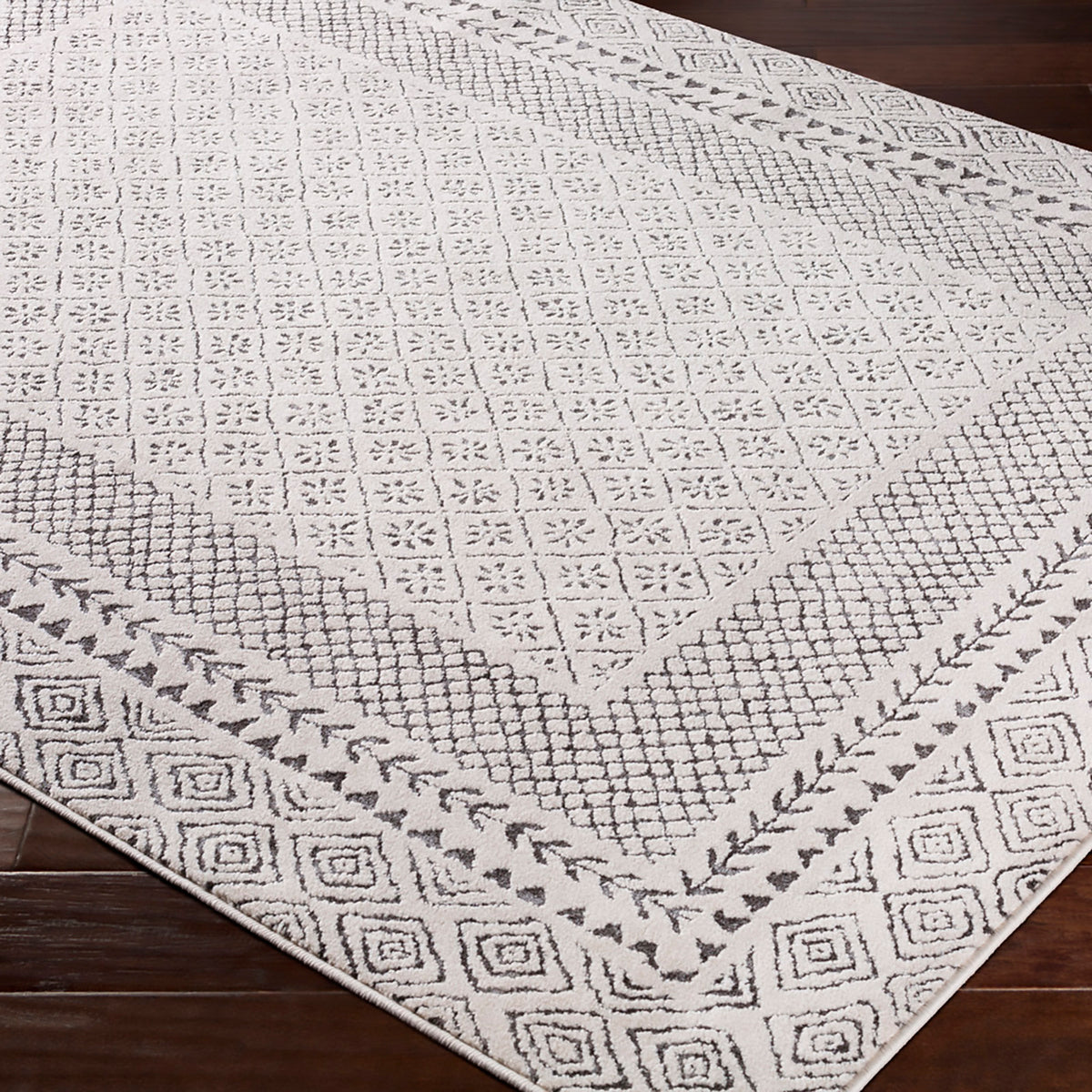 Tapis rond SURYA Monaco géométrique, bordure de losanges anthracite sur fond beige clair, vue 6