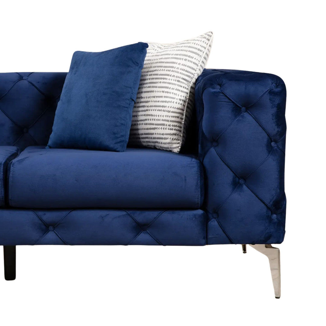 Canapé LES TENDANCES Herakles 2 places capitonné en velours bleu marine et pieds chromés 197 cm