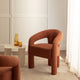 Fauteuil rembourré SKLUM Greca en tissu bouclé terracotta