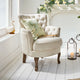Fauteuil capitonné LOBERON Calgary en tissu bouclette crème — photo produit