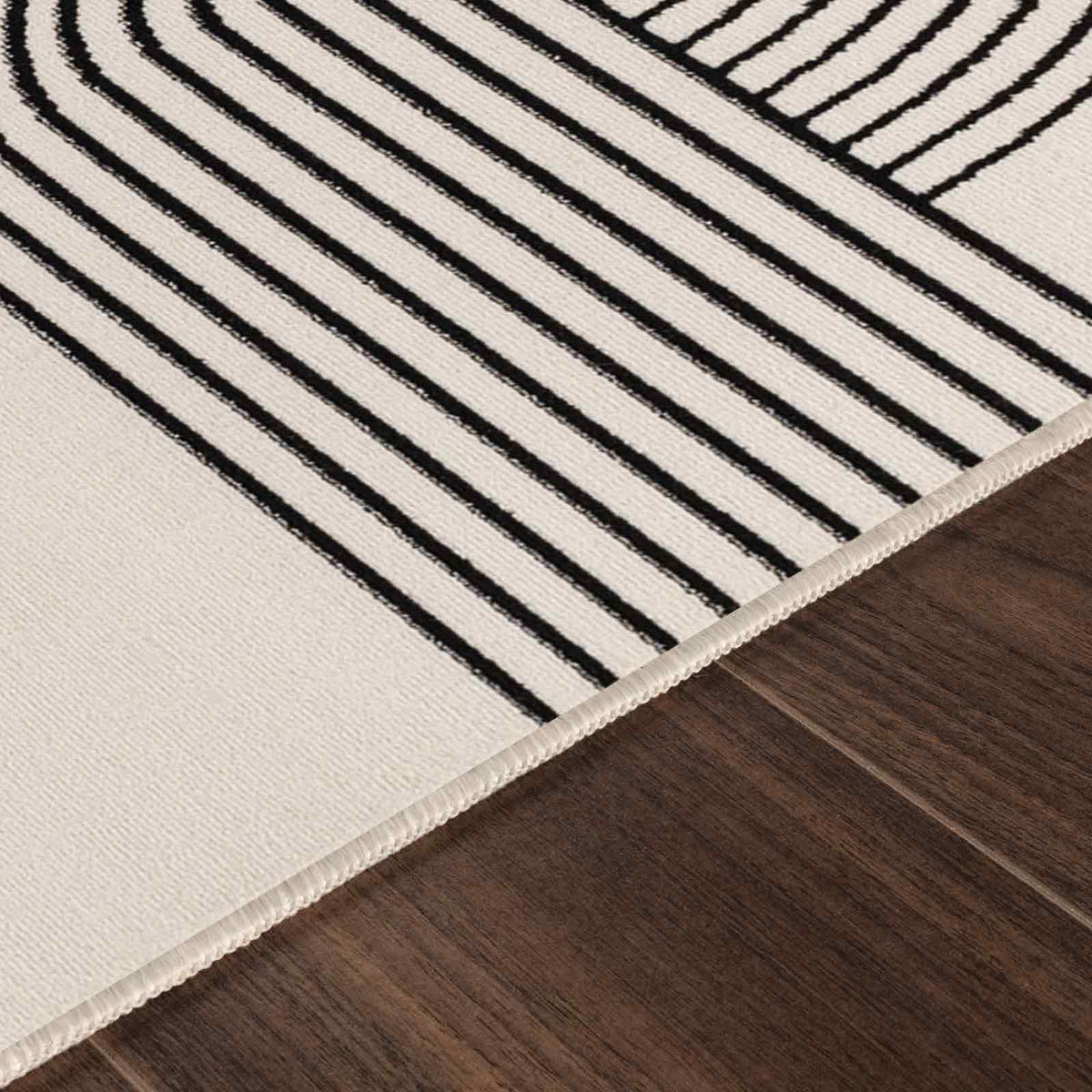Tapis SURYA Constance rétro, motif arcs concentriques, blanc cassé et noir, vue 11