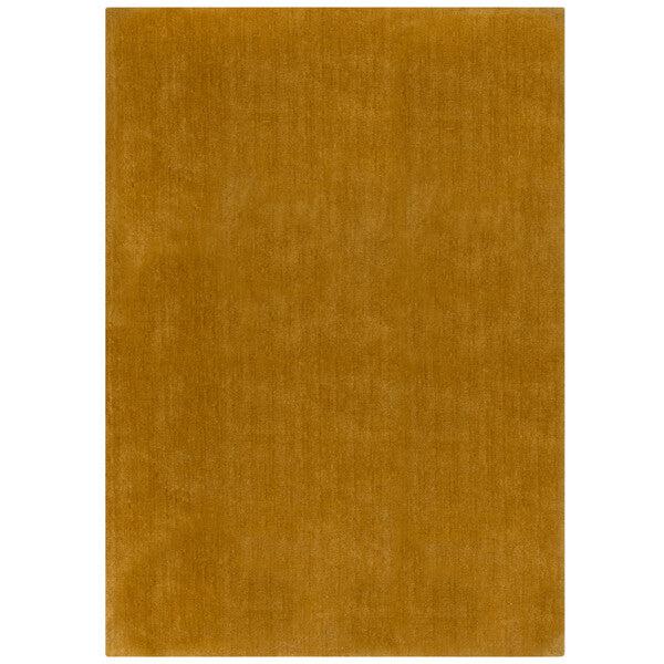 tapis isla couleur or sur fond blanc